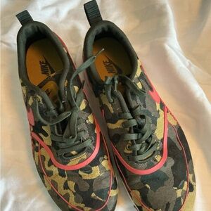 Nike woman’s Camo Sneakers with Pink/Orange Accents